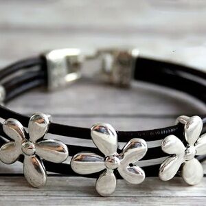 Black Multi-Strand Floral Accent Bracelet with Silver Flowers
